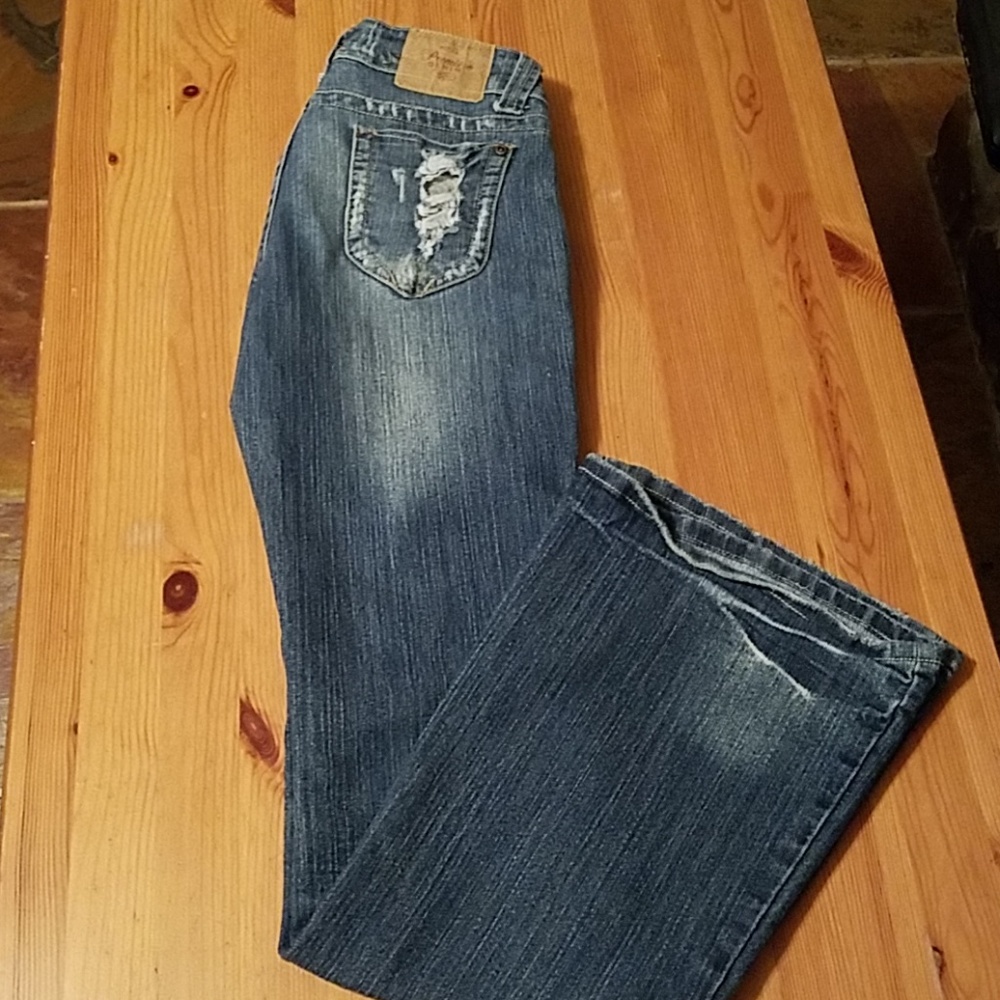 Premire Denim size 1/2 flare leg, distressed jeans